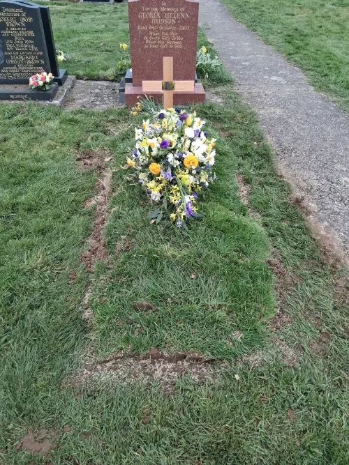 Restored grave site after interment